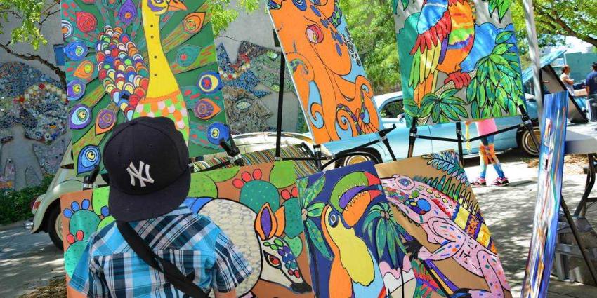 Child viewing art in Aurora