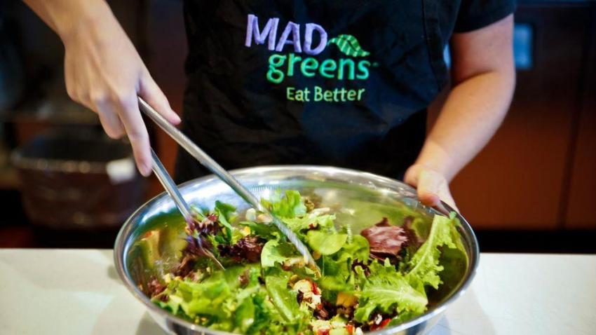 Make making a salad at Mad Greens