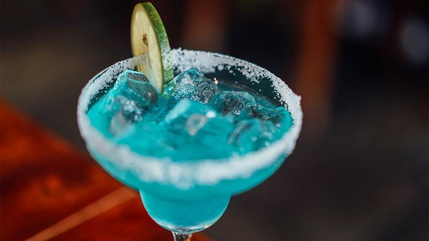 Blue margarita with salt and a lime in Aurora Colorado