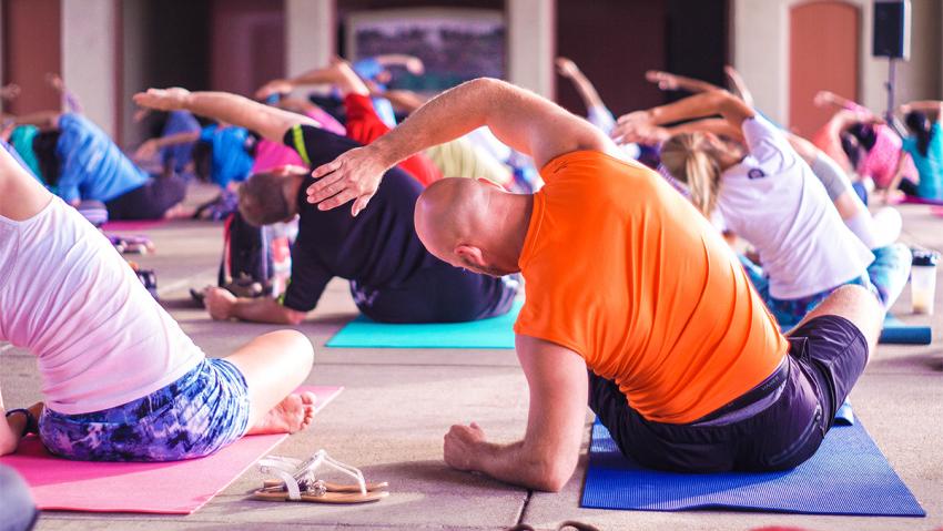 Group of people doing yoga