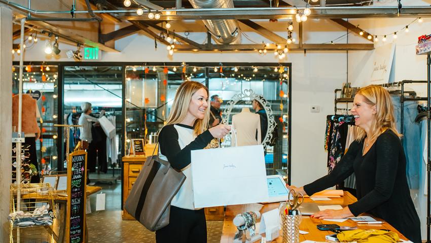 Woman shopping at Stanley Marketplace in Aurora, Colorado