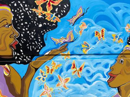 Meet the Brazilian Muralist, Jiacuy Roche, the artist behind Butterfly Magic in Aurora, Colorado
