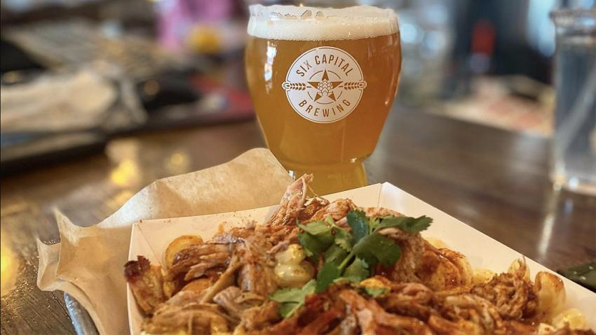 A tasty plate of mac & cheese is paired with a locally brewed beer at Six Capital Brewing in Aurora CO