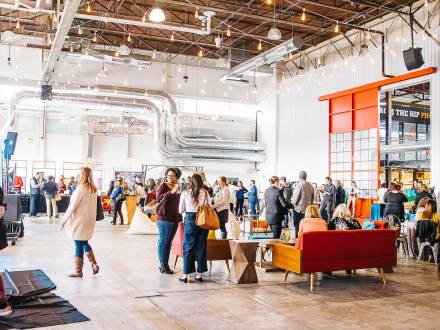 A casual hospitality marketing event takes place in The Hangar, Stanley Marketplaces' multi-use event space.