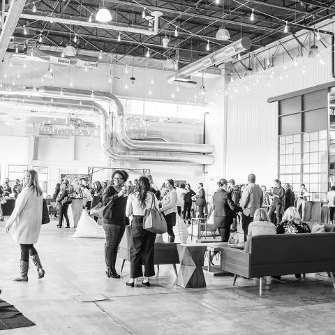 A casual hospitality marketing event takes place in The Hangar, Stanley Marketplaces' multi-use event space.